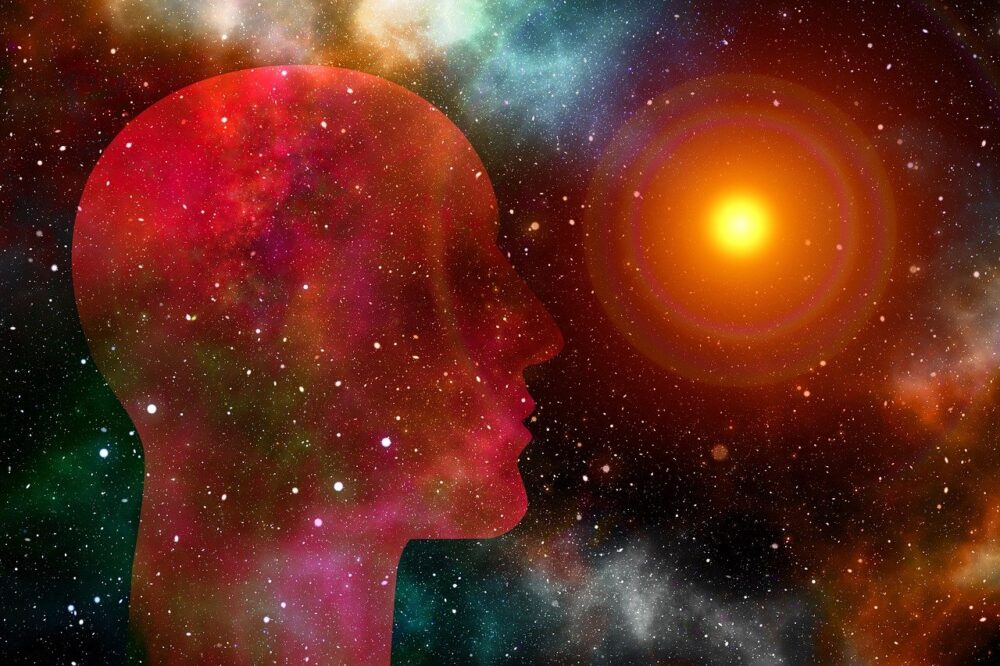 Abstract image of man in a galaxy with a star in the distance